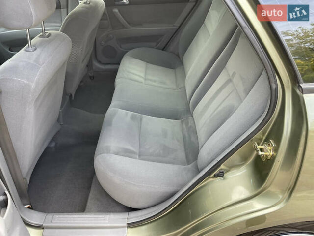 Зелений Шевроле Лачетті, об'ємом двигуна 1.8 л та пробігом 104 тис. км за 5200 $, фото 51 на Automoto.ua