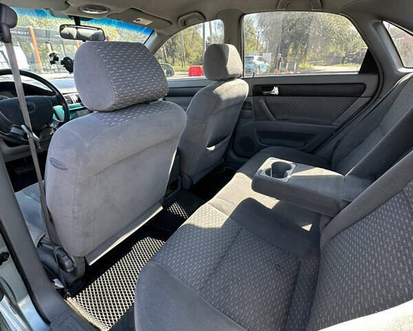 Зелений Шевроле Лачетті, об'ємом двигуна 1.8 л та пробігом 222 тис. км за 4000 $, фото 13 на Automoto.ua