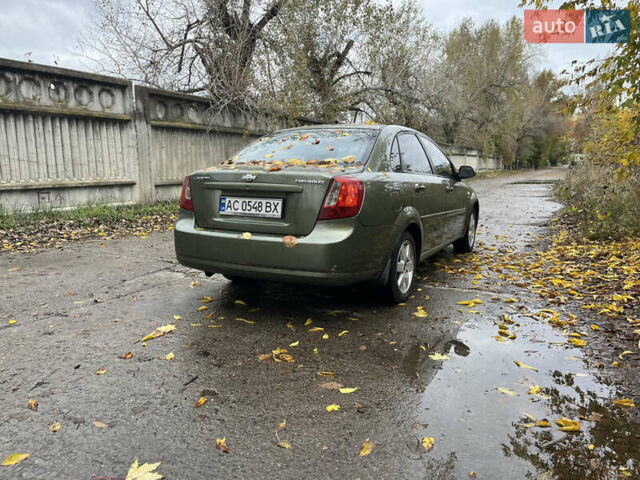 Зеленый Шевроле Лачетти, объемом двигателя 1.8 л и пробегом 289 тыс. км за 2300 $, фото 9 на Automoto.ua