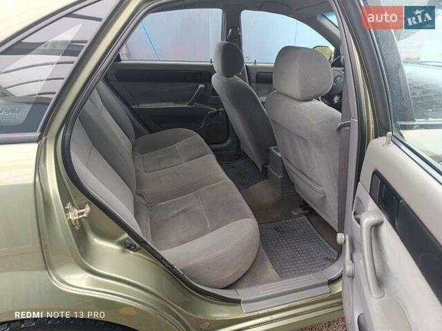 Зелений Шевроле Лачетті, об'ємом двигуна 1.6 л та пробігом 280 тис. км за 3499 $, фото 10 на Automoto.ua