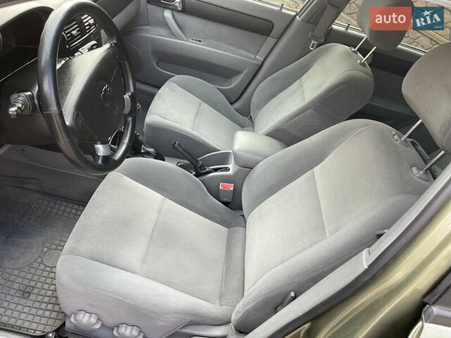 Зелений Шевроле Лачетті, об'ємом двигуна 1.8 л та пробігом 104 тис. км за 5200 $, фото 23 на Automoto.ua