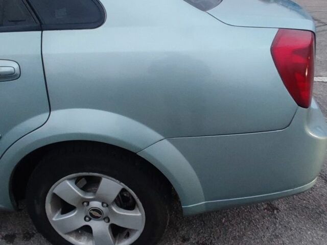 Зеленый Шевроле Лачетти, объемом двигателя 1.6 л и пробегом 223 тыс. км за 3900 $, фото 11 на Automoto.ua