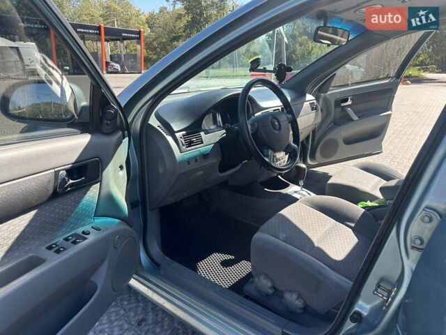 Зелений Шевроле Лачетті, об'ємом двигуна 1.8 л та пробігом 222 тис. км за 4000 $, фото 7 на Automoto.ua