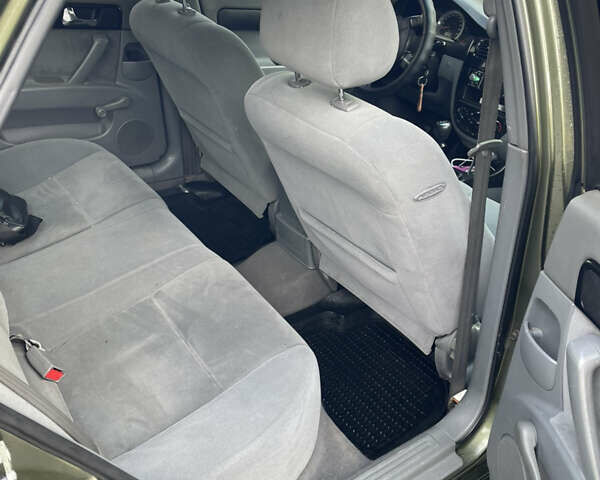 Зеленый Шевроле Лачетти, объемом двигателя 1.8 л и пробегом 300 тыс. км за 3250 $, фото 10 на Automoto.ua