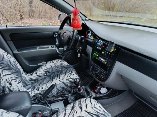 Зеленый Шевроле Лачетти, объемом двигателя 1.8 л и пробегом 208 тыс. км за 3800 $, фото 5 на Automoto.ua