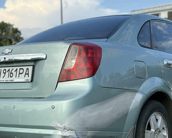 Зелений Шевроле Лачетті, об'ємом двигуна 1.8 л та пробігом 323 тис. км за 4200 $, фото 29 на Automoto.ua
