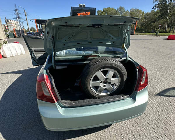 Зелений Шевроле Лачетті, об'ємом двигуна 1.8 л та пробігом 222 тис. км за 4000 $, фото 16 на Automoto.ua