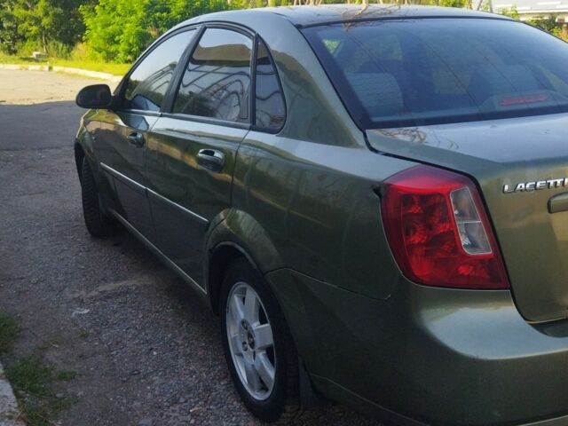 Зеленый Шевроле Лачетти, объемом двигателя 1.8 л и пробегом 273 тыс. км за 2300 $, фото 4 на Automoto.ua