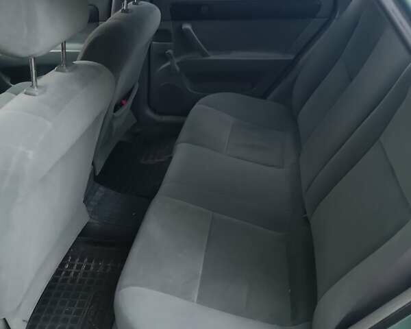 Зеленый Шевроле Лачетти, объемом двигателя 1.6 л и пробегом 203 тыс. км за 3600 $, фото 6 на Automoto.ua