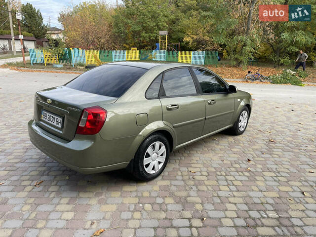 Зелений Шевроле Лачетті, об'ємом двигуна 1.8 л та пробігом 104 тис. км за 5200 $, фото 7 на Automoto.ua