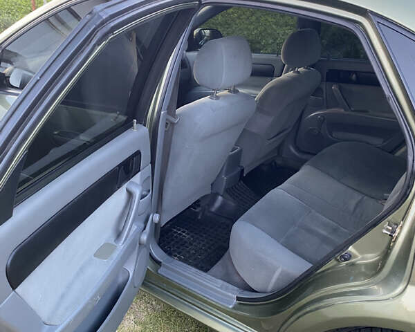 Зеленый Шевроле Лачетти, объемом двигателя 1.6 л и пробегом 350 тыс. км за 3700 $, фото 7 на Automoto.ua