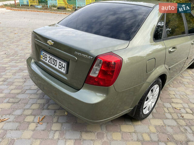 Зелений Шевроле Лачетті, об'ємом двигуна 1.8 л та пробігом 104 тис. км за 5200 $, фото 14 на Automoto.ua