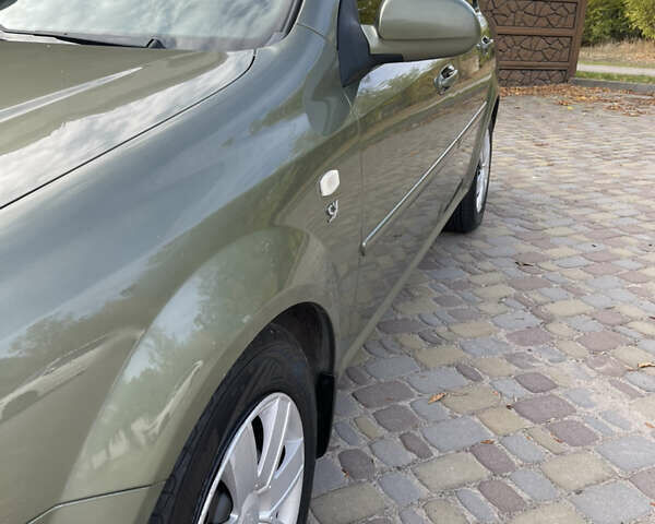 Зелений Шевроле Лачетті, об'ємом двигуна 1.8 л та пробігом 104 тис. км за 5200 $, фото 10 на Automoto.ua