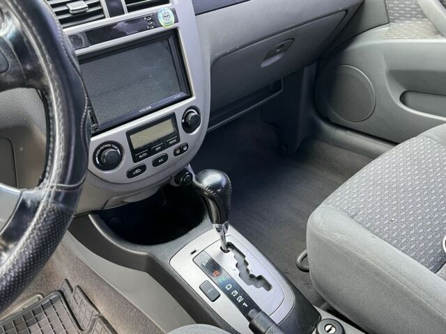 Зеленый Шевроле Лачетти, объемом двигателя 1.8 л и пробегом 230 тыс. км за 3700 $, фото 6 на Automoto.ua