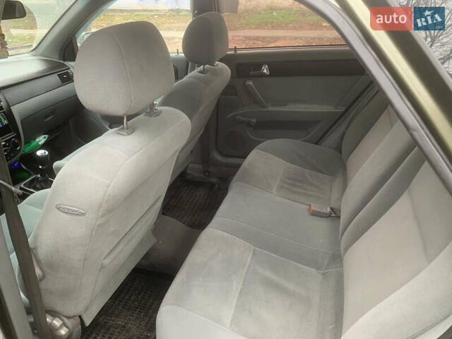 Зеленый Шевроле Лачетти, объемом двигателя 1.8 л и пробегом 300 тыс. км за 3200 $, фото 8 на Automoto.ua