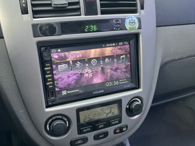 Зеленый Шевроле Лачетти, объемом двигателя 1.8 л и пробегом 230 тыс. км за 3700 $, фото 11 на Automoto.ua