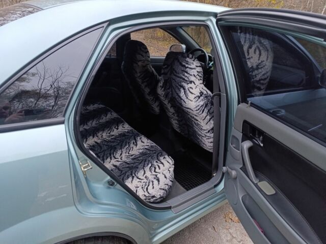 Зеленый Шевроле Лачетти, объемом двигателя 1.8 л и пробегом 208 тыс. км за 3800 $, фото 7 на Automoto.ua