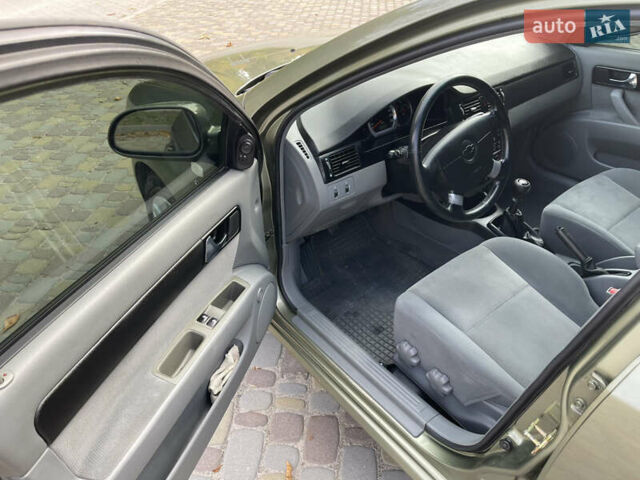 Зелений Шевроле Лачетті, об'ємом двигуна 1.8 л та пробігом 104 тис. км за 5200 $, фото 21 на Automoto.ua