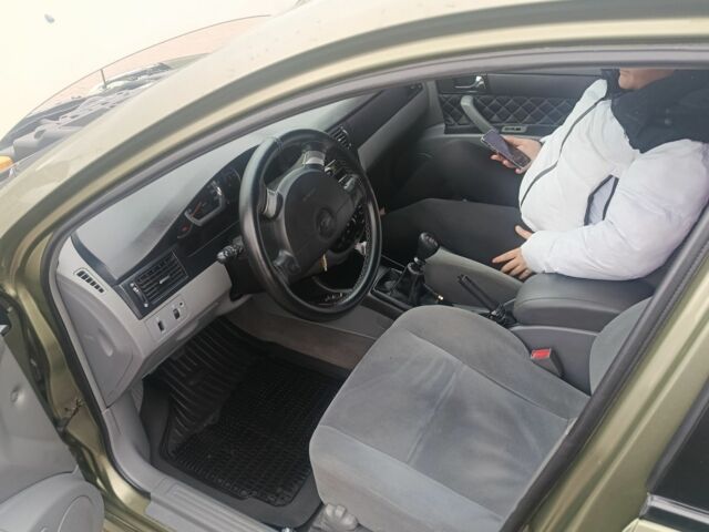 Зеленый Шевроле Лачетти, объемом двигателя 1.6 л и пробегом 253 тыс. км за 3650 $, фото 6 на Automoto.ua