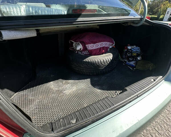 Зелений Шевроле Лачетті, об'ємом двигуна 1.8 л та пробігом 222 тис. км за 4000 $, фото 15 на Automoto.ua