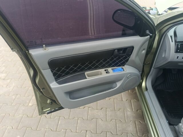 Зеленый Шевроле Лачетти, объемом двигателя 1.6 л и пробегом 253 тыс. км за 3650 $, фото 7 на Automoto.ua