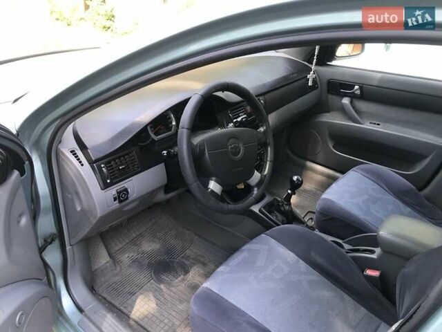 Зеленый Шевроле Лачетти, объемом двигателя 1.8 л и пробегом 249 тыс. км за 4050 $, фото 12 на Automoto.ua