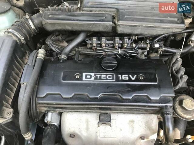 Зеленый Шевроле Лачетти, объемом двигателя 1.8 л и пробегом 249 тыс. км за 4050 $, фото 2 на Automoto.ua