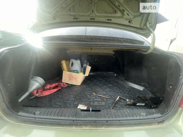 Зеленый Шевроле Лачетти, объемом двигателя 1.6 л и пробегом 242 тыс. км за 4500 $, фото 6 на Automoto.ua