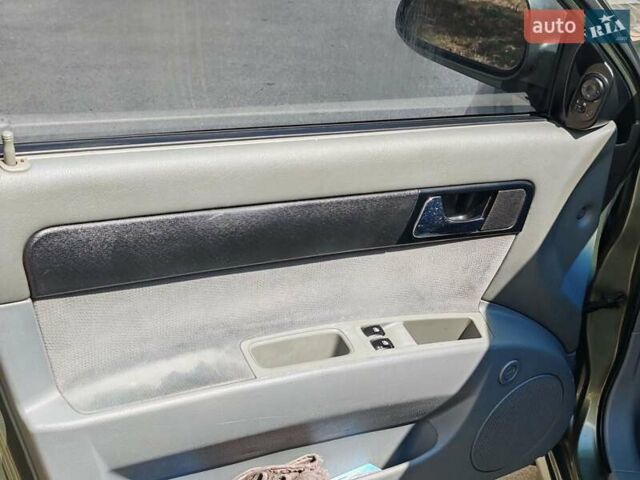 Зеленый Шевроле Лачетти, объемом двигателя 1.8 л и пробегом 280 тыс. км за 4300 $, фото 2 на Automoto.ua