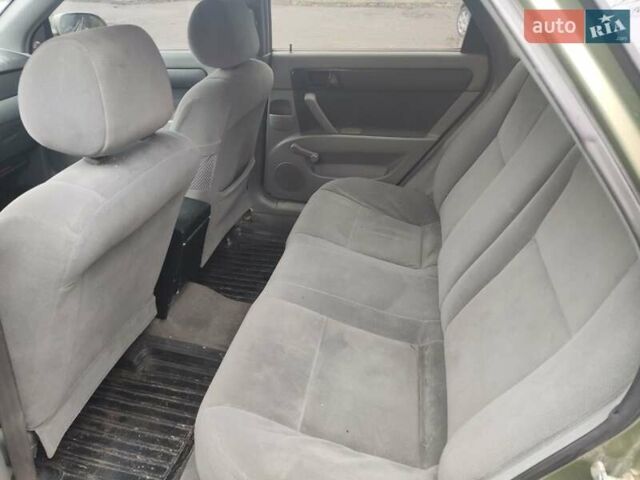 Зеленый Шевроле Лачетти, объемом двигателя 1.6 л и пробегом 373 тыс. км за 2500 $, фото 1 на Automoto.ua