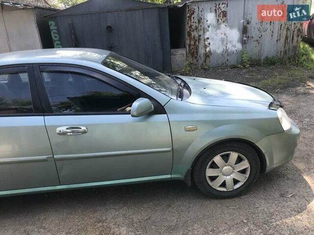 Зеленый Шевроле Лачетти, объемом двигателя 1.8 л и пробегом 249 тыс. км за 4050 $, фото 11 на Automoto.ua