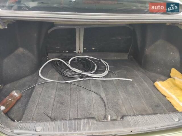 Зеленый Шевроле Лачетти, объемом двигателя 1.6 л и пробегом 373 тыс. км за 2500 $, фото 16 на Automoto.ua