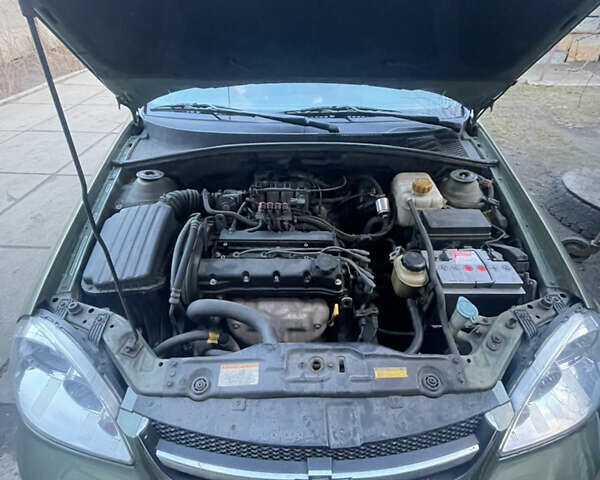 Зеленый Шевроле Лачетти, объемом двигателя 1.6 л и пробегом 242 тыс. км за 4500 $, фото 5 на Automoto.ua