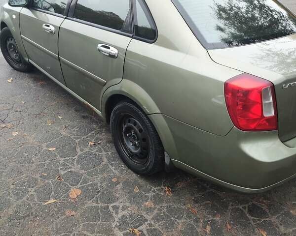 Зеленый Шевроле Лачетти, объемом двигателя 1.6 л и пробегом 373 тыс. км за 2500 $, фото 13 на Automoto.ua