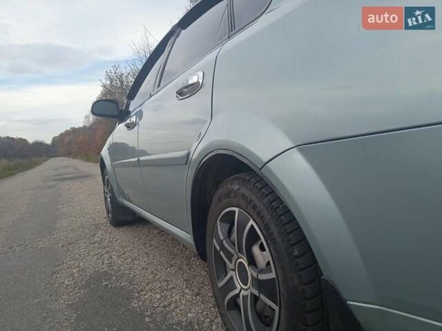 Зелений Шевроле Лачетті, об'ємом двигуна 1.6 л та пробігом 255 тис. км за 3999 $, фото 20 на Automoto.ua