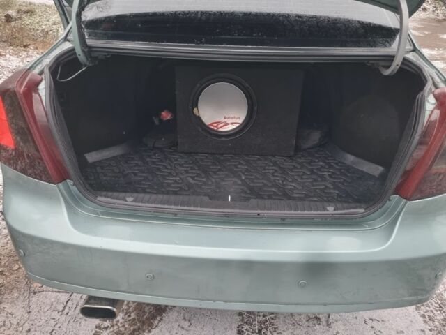 Зелений Шевроле Лачетті, об'ємом двигуна 1.8 л та пробігом 285 тис. км за 3900 $, фото 1 на Automoto.ua