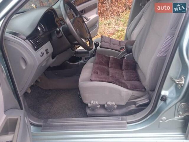 Зелений Шевроле Лачетті, об'ємом двигуна 1.6 л та пробігом 255 тис. км за 3999 $, фото 31 на Automoto.ua