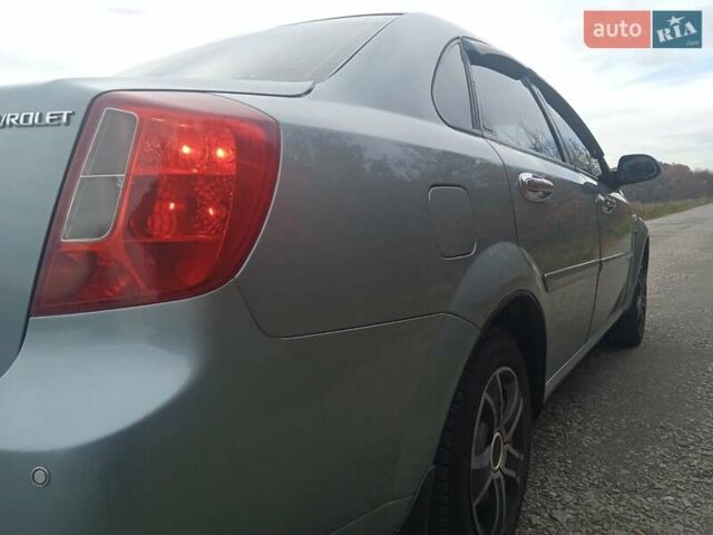 Зелений Шевроле Лачетті, об'ємом двигуна 1.6 л та пробігом 255 тис. км за 3999 $, фото 19 на Automoto.ua
