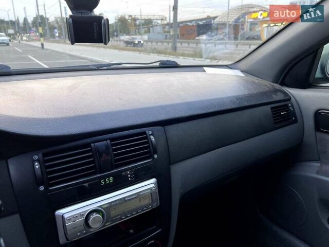 Зелений Шевроле Лачетті, об'ємом двигуна 1.8 л та пробігом 301 тис. км за 4000 $, фото 11 на Automoto.ua