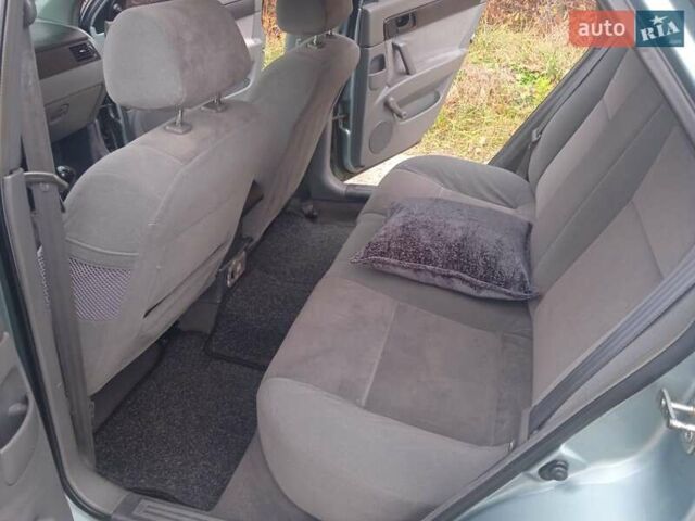 Зелений Шевроле Лачетті, об'ємом двигуна 1.6 л та пробігом 255 тис. км за 3999 $, фото 33 на Automoto.ua