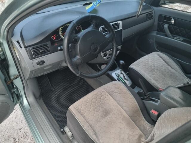 Зелений Шевроле Лачетті, об'ємом двигуна 1.8 л та пробігом 285 тис. км за 3900 $, фото 7 на Automoto.ua