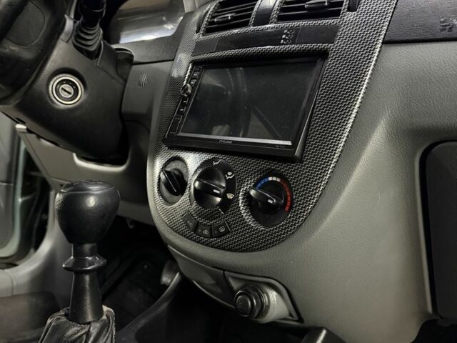 Зелений Шевроле Лачетті, об'ємом двигуна 1.8 л та пробігом 199 тис. км за 3800 $, фото 12 на Automoto.ua