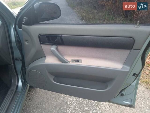 Зелений Шевроле Лачетті, об'ємом двигуна 1.6 л та пробігом 255 тис. км за 3999 $, фото 26 на Automoto.ua