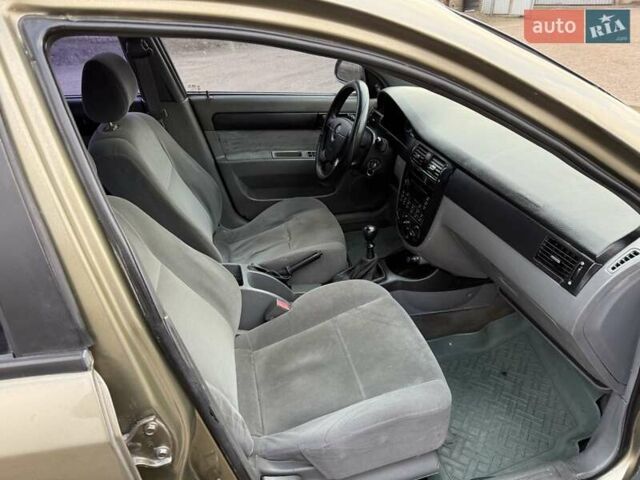 Зеленый Шевроле Лачетти, объемом двигателя 1.6 л и пробегом 210 тыс. км за 2850 $, фото 10 на Automoto.ua