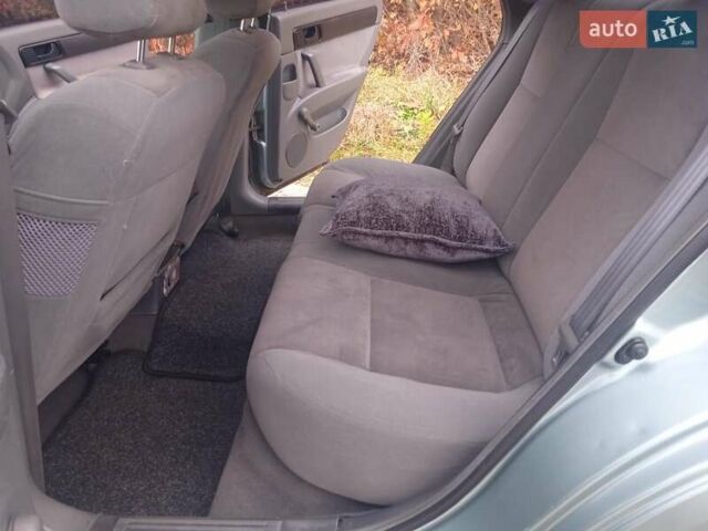 Зелений Шевроле Лачетті, об'ємом двигуна 1.6 л та пробігом 255 тис. км за 3999 $, фото 29 на Automoto.ua