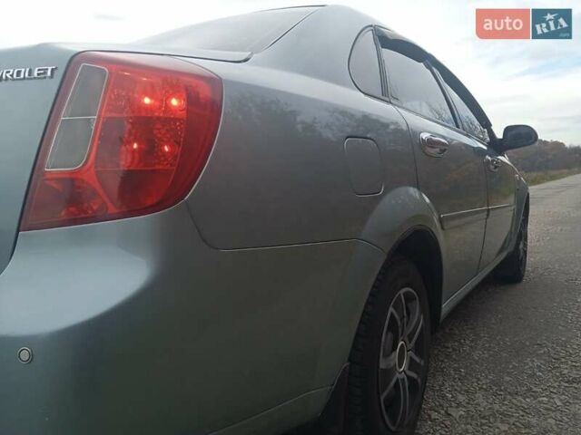 Зелений Шевроле Лачетті, об'ємом двигуна 1.6 л та пробігом 255 тис. км за 3999 $, фото 21 на Automoto.ua