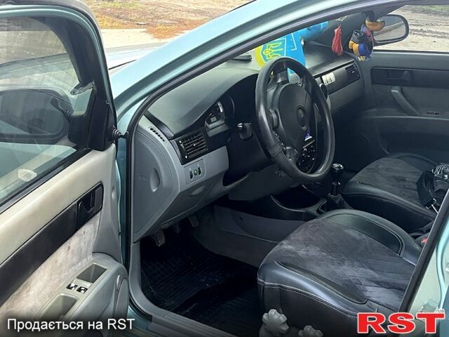 Зелений Шевроле Лачетті, об'ємом двигуна 1.6 л та пробігом 236 тис. км за 4500 $, фото 10 на Automoto.ua