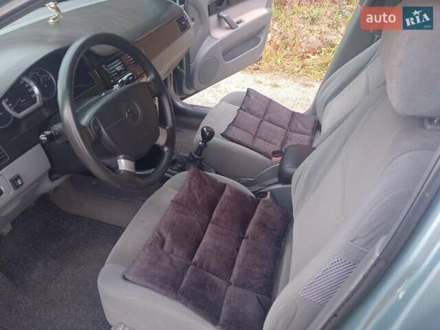 Зелений Шевроле Лачетті, об'ємом двигуна 1.6 л та пробігом 255 тис. км за 3999 $, фото 35 на Automoto.ua