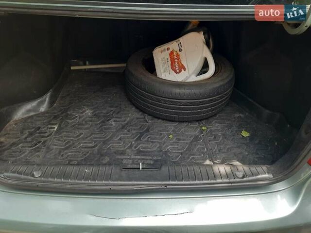 Зеленый Шевроле Лачетти, объемом двигателя 1.8 л и пробегом 230 тыс. км за 3777 $, фото 7 на Automoto.ua