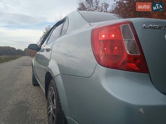 Зелений Шевроле Лачетті, об'ємом двигуна 1.6 л та пробігом 255 тис. км за 3999 $, фото 22 на Automoto.ua